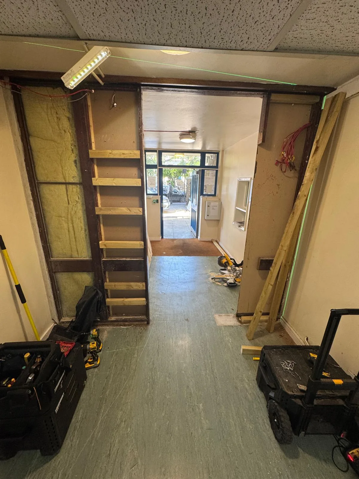 Communal doorway stripped back during replacement works