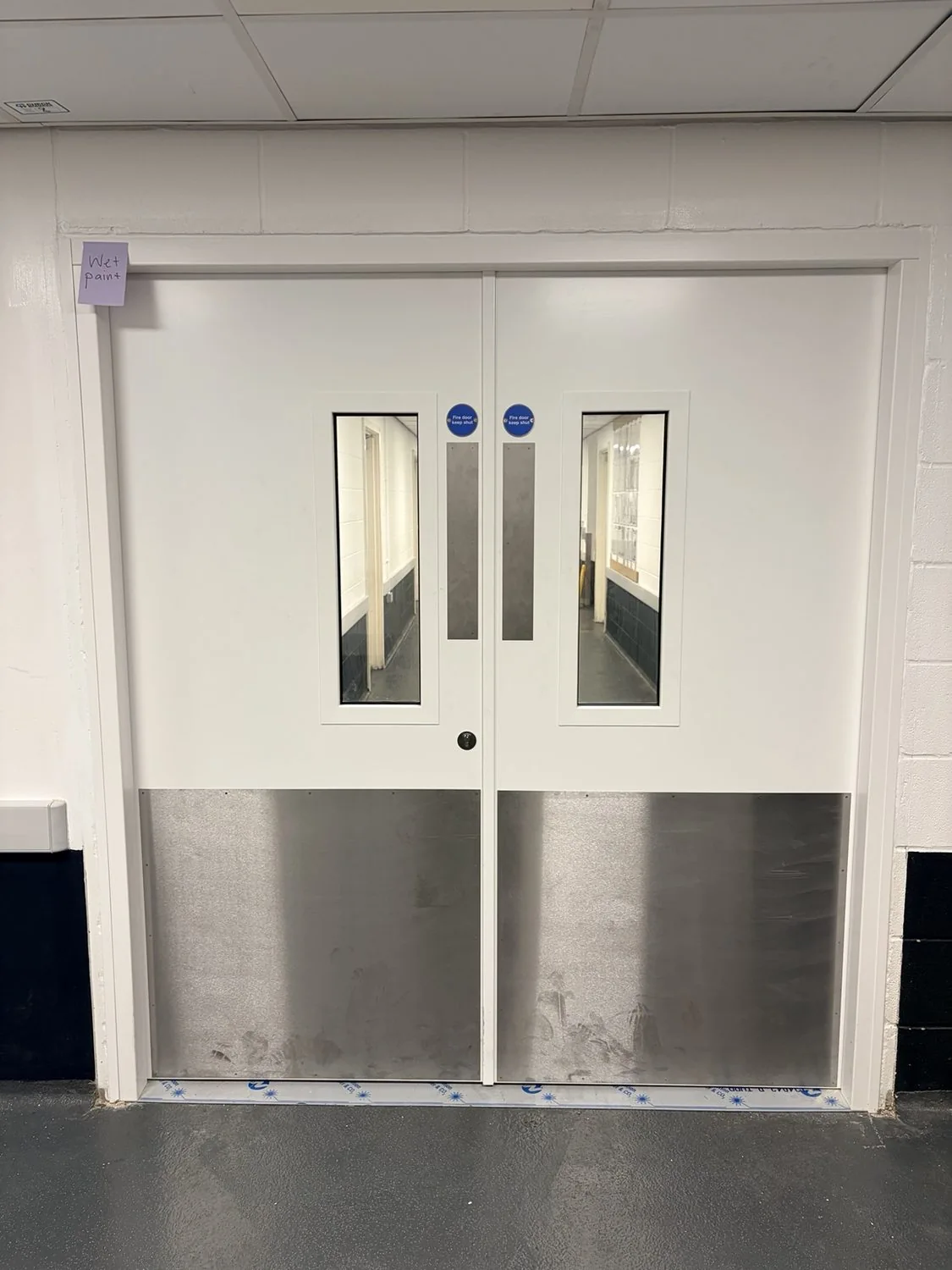 New double fire door set — first side