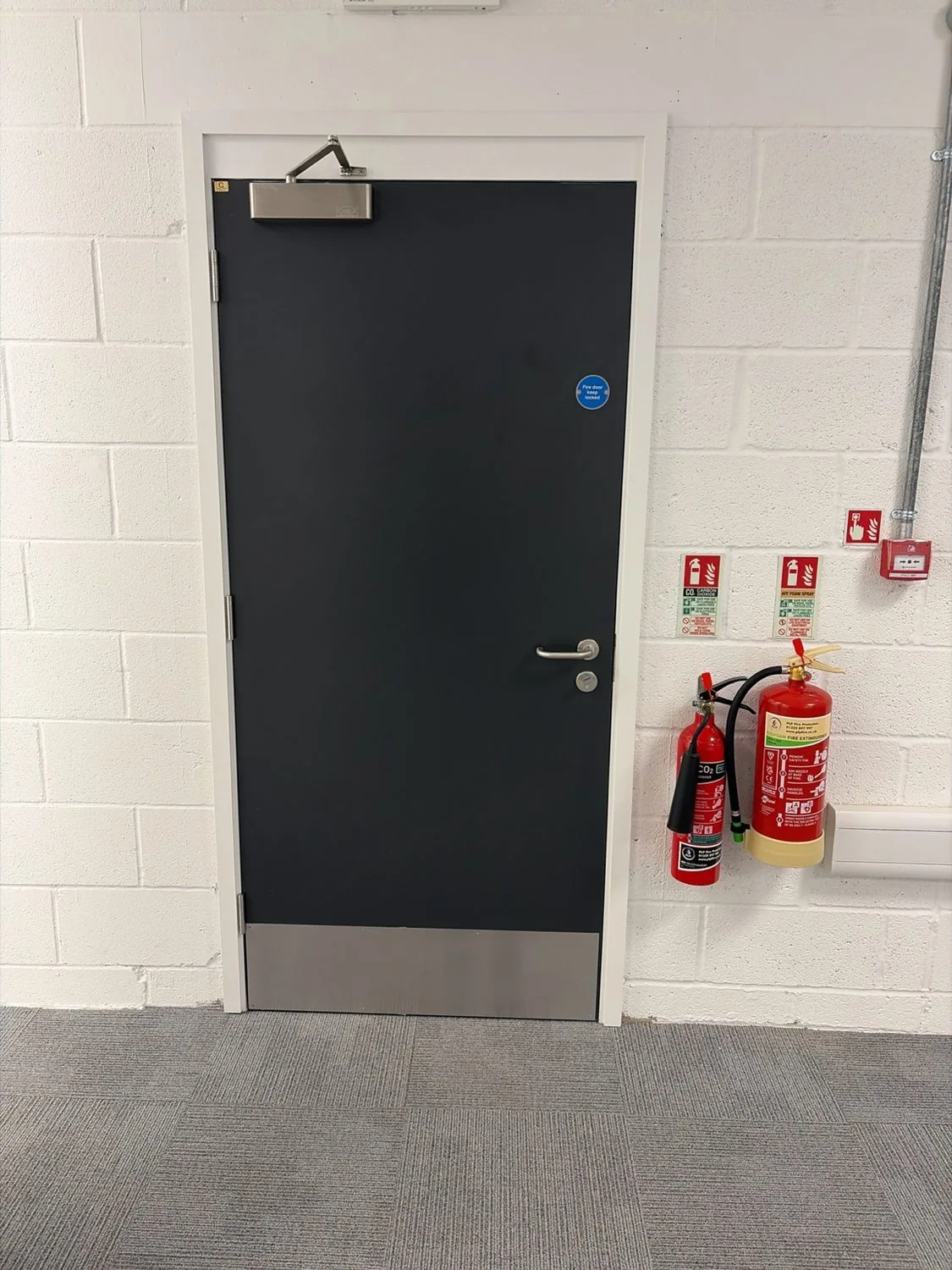 Single fire door with closer and lower protection plate